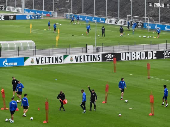 FC Schalke 04 players exercise during a training session in Gelsenkirchen.