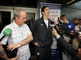 Ireland defender bid a final farewell to his father, Brian (left) at a funeral service in Derry this morning.