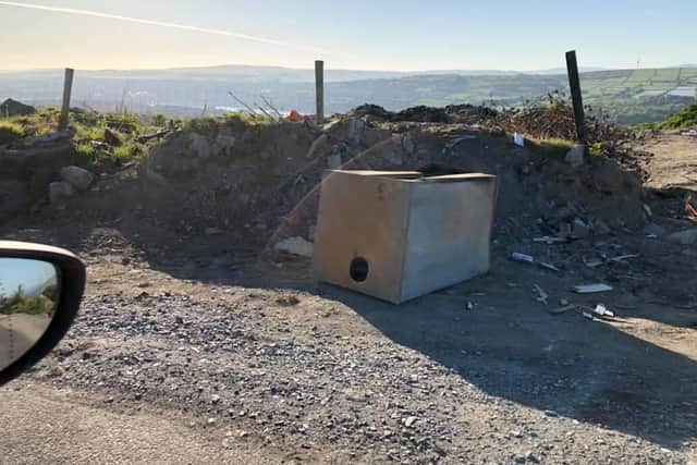 An item illegally dumped on the side of the Glassagh Road.