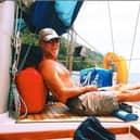 MASTER AND COMMANDER... Garry Crothers relaxes in the sun aboard his yacht ‘Kind of Blue’.