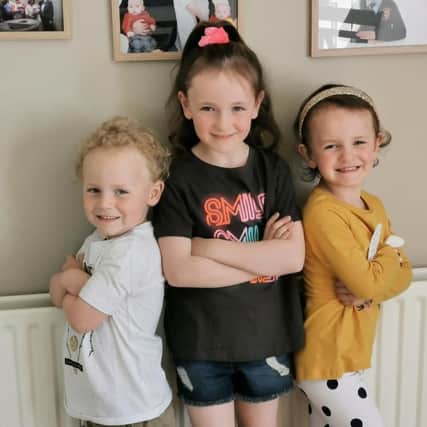 Hannah, who is now four-years-old, on the right with her twin brother Peadar on the left and older sister Elsie.