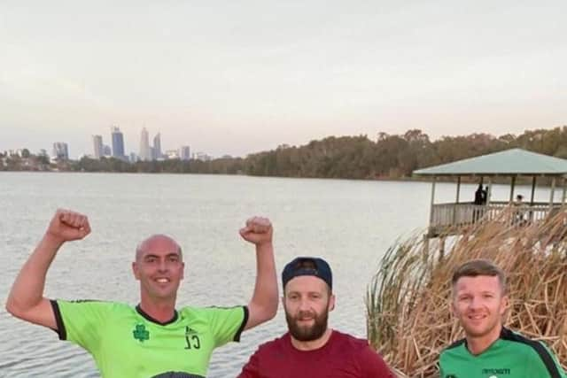 The East Perth FC members do their bit 'Down Under'.