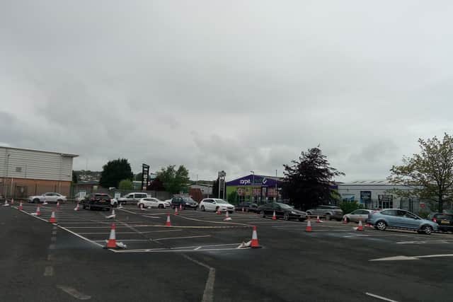 Cars queue at the Pennyburn recycling depot on Monday.
