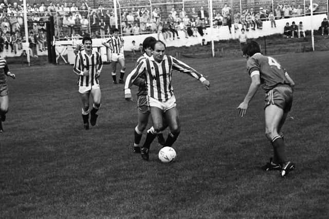 Dennis Tueart in action in Derry City's first game in the League of Ireland against Home Farm, at a packed Brandywell way back in 1985.