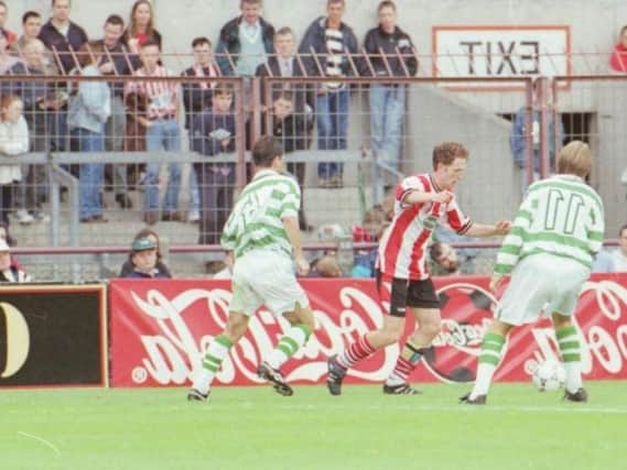 Derry City's Ryan Coyle taking on Celtic duo Jackie McNamara and Simon Donnelly at Lansdowne Road in July 1997.