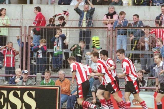 Ryan Coyle is congratulated by team-mates Liam Coyle, Peter Hutton and Gary Beckett after his match-winning goal against Celtic in Lansdowne Road in July 1997.