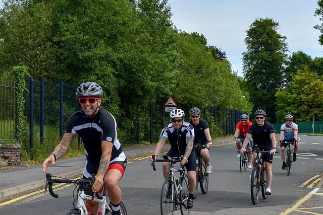 ON YER BIKE . . .  cyclists get their 90 day challenge underway at Ardnashee School and College.