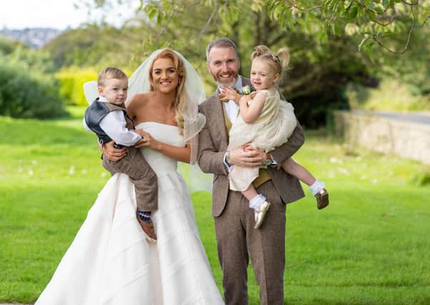 Adam and Aoife Burke, pictured with their parents.