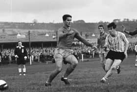 Derry City's Matt Doherty has a shot which is gathered cleanly by Steaua Bucharest keeper Dumitru Eremia during the second leg of the European Cup Winners' Cup tie  at Brandywell Stadium.