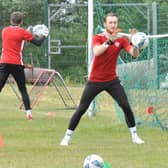 Derry City goalkeepers, Peter Cherrie and Nathan Gartside get back in the swing of things during a training session at Aileach FC in Burnfoot, Donegal.