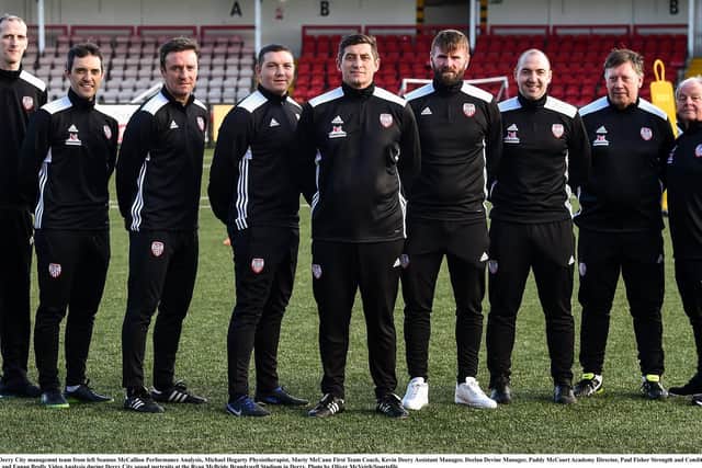 The Derry City management team, including Marty McCann (third from left) are ready to get back to action today.