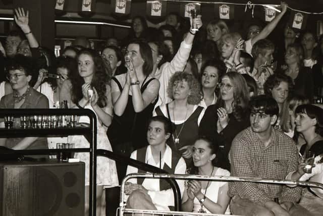 An anxious moment as supporters await the result of the 1995 Miss Derry final in Squires Nightclub.