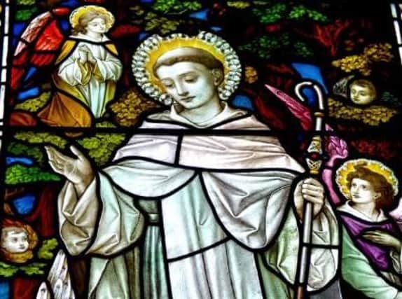 One of the stain glass windows in St Columbas Church, Long Tower, depicting Saint Columba, the patron saint of Derry. DER2320GS - 002