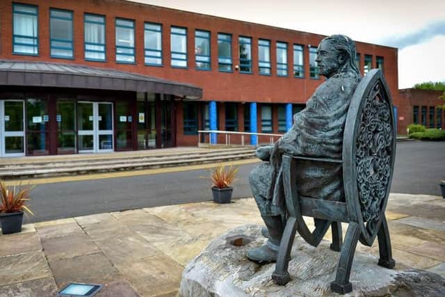 A sculpture of St Columba at the entrance to St Columbs College Derry, created by Alumni Maurice Harron. DER2320GS - 001