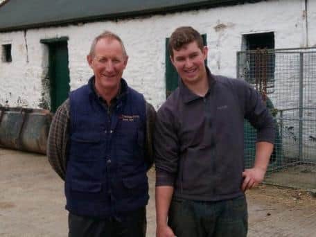 Father and son David and Gordon Crockett in their farmyard on the Derry side of the border.
