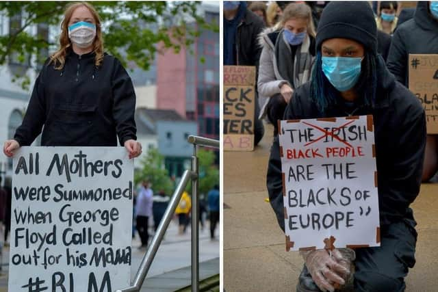 Protesters pictured with thought-provoking signs at the Black Lives Matter rally in Derry on Saturday.