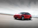 The new Tesla Model Y electric vehicle is hailed as the future of driving.