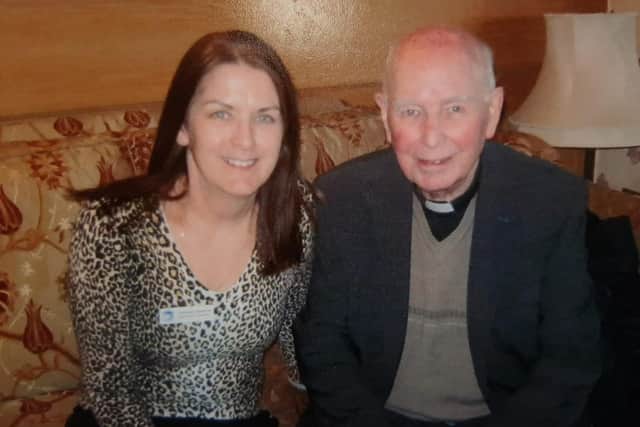 Yvonne with Bishop Daly.