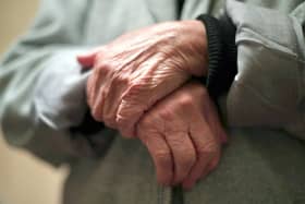 The hands of an elderly woman