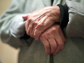 The hands of an elderly woman