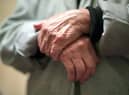 The hands of an elderly woman