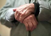 The hands of an elderly woman