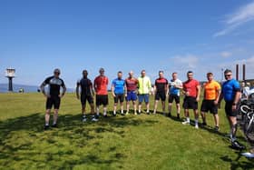 The group of cyclists who have undertaken a mammoth 10,000 miles cycle in aid of Ardnashee School and College, pictured in Buncrana on Sunday as they began week three of the challenge.