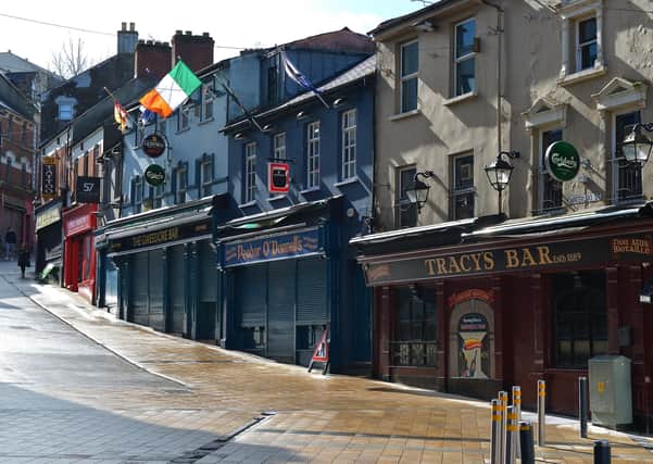 Derry's pubs were among the first businesses to close. DER1220GS - 012