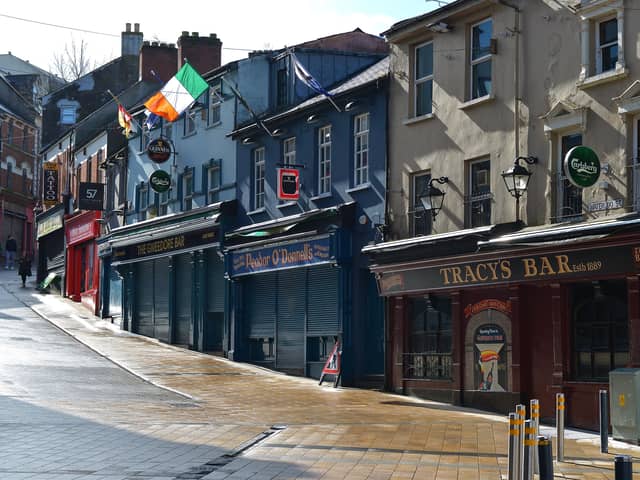 Derry's pubs were among the first businesses to close. DER1220GS - 012