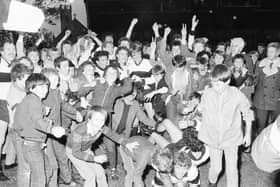 Dungiven players and supporters celebrate their 1983 Derry senior Championship victory over Magherafelt.