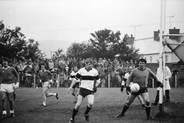 Keeper John Somers watches the ball sail wide during Dungiven's 1983 Derry Senior Championship victory over Magherafelt in Ballinascreen.