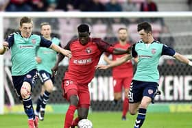 Midtjylland's Paul Onuacho pictured with Ronan Curtis and Rory Holden of Derry when the Candy Stripes last appeared in European competition in 2017.