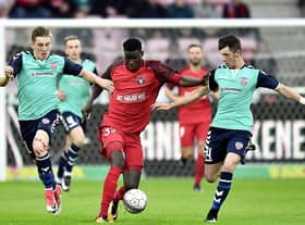 Midtjylland's Paul Onuacho pictured with Ronan Curtis and Rory Holden of Derry when the Candy Stripes last appeared in European competition in 2017.