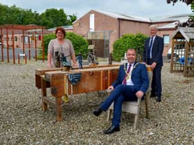 The Mayor of Derry and Strabane Colr. Brian Tierney pictured with Pauline Flangan, Service Manager Action Mental Health New Horizons and David Babington, CEO, during a visit to the charity’s facility in Springtown Industrial Estate. DER2025GS - 053