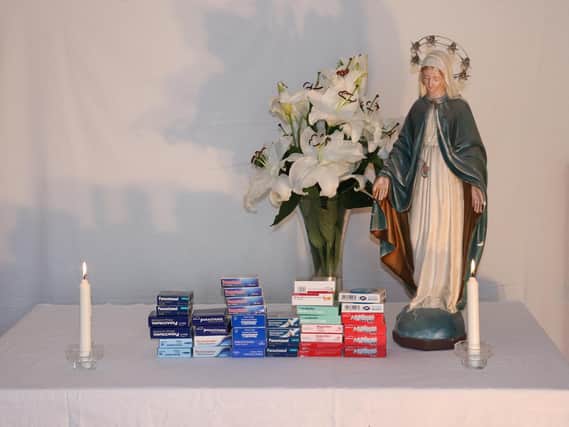 Still life May Altar featuring pandemic medication by participant Biddy Healy.