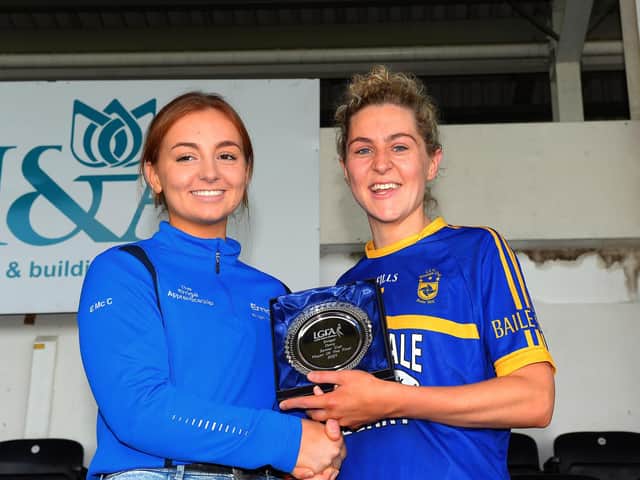 Orla McCloskey presents the Errigal 2021 Senior Championship Player of the Final Award to Steelstown Brian Og’s Aoife McGough in Celtic Park on Saturday afternoon last. Photo: George Sweeney. DER2139GS – 051
