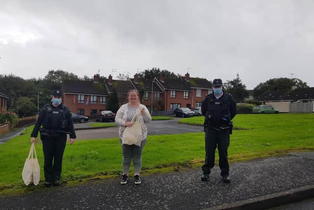Waterside Neighbourhood Team out speaking with local residents about home security. Constables Doherty and Barr are pictured here delivering a home kit to Ms Broom for her elderly mother.