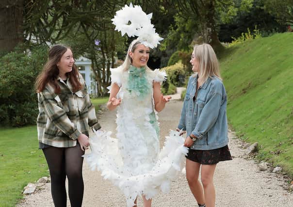 Pictured are last year's overall winning design Synergy, modelled by Bronach Harkin, and designed by Robyn O Donnell and Orlaith Doherty (also pictured), from Carndonagh Community School, Donegal.

Pic: Brian McEvoy