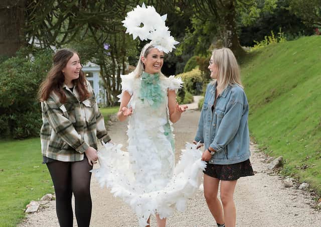 Pictured are last year's overall winning design Synergy, modelled by Bronach Harkin, and designed by Robyn O Donnell and Orlaith Doherty (also pictured), from Carndonagh Community School, Donegal.
Pic: Brian McEvoy