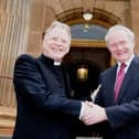 2011... Rev. David Latimer and Martin McGuinness outside First Derry Presbyterian.