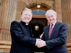 2011... Rev. David Latimer and Martin McGuinness outside First Derry Presbyterian.
