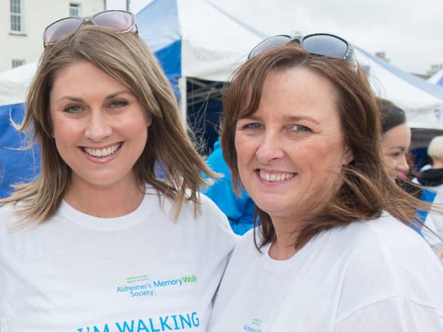 Bernadine McCrory with Sarah Travers at a memory walk in Derry a number of years ago.