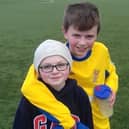 Liam pictured with younger brother Tadhg after playing a game for Clare U13s team about three years ago.
