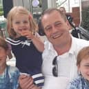 Andrew McGinley, with his children Conor, Carla and Darragh.