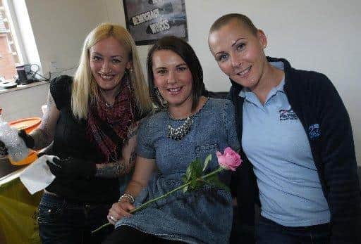 Tattooist Liosa Ni Chiarain pictured with sisters Kate McLaughlin and Michelle McLaren at a Pink Ladies Tattoo event in 2014. DER2714MC150