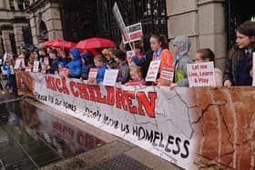 Children who live in houses affected by mica protest outside Dail Eireann.