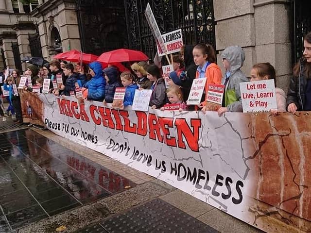 Children who live in houses affected by mica protest outside Dail Eireann.