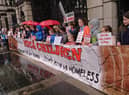 Children who live in houses affected by mica protest outside Dail Eireann.