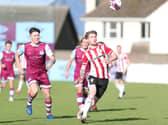 Derry City's Jamie McGonigle keeps his eye on the ball as he runs at the Drogheda United back-line. Picture by Kevin Moore/MCI