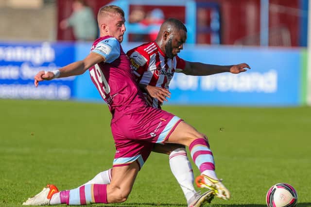 Derry City striker James Akintunde holds off Drogheda United midfielder Killian Phillips, during Sunday's clash, at Head in the Game Park. Picture by Kevin Moore/MCI